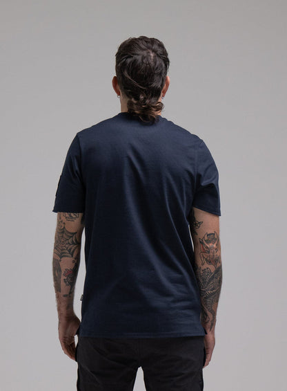 George Is 5ft 11" And Wears Size: S | Hem Studio Image Of Model Wearing Insignia T-Shirt G1 In Dark Sapphire (SS Model)