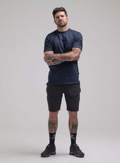 George Is 5ft 11" And Wears Size: S | Hem Studio Image Of Model Wearing Insignia T-Shirt G1 In Dark Sapphire (SS Model)