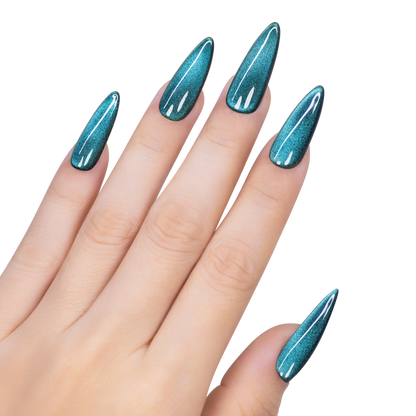 Hand with blue glittery nail polish on a white background