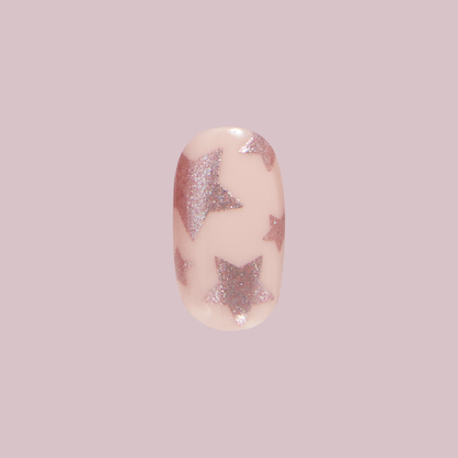 Large Star Overlap | Round | Short press-on nail with bronze star design for a quick and chic mani by Olive and June