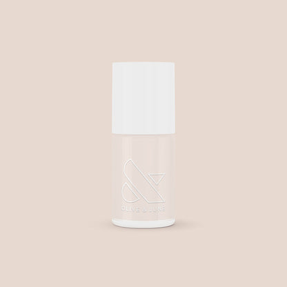 Olive and June LHG nail polish bottle in a fresh neutral shade with a subtle pink tint for classic manicures