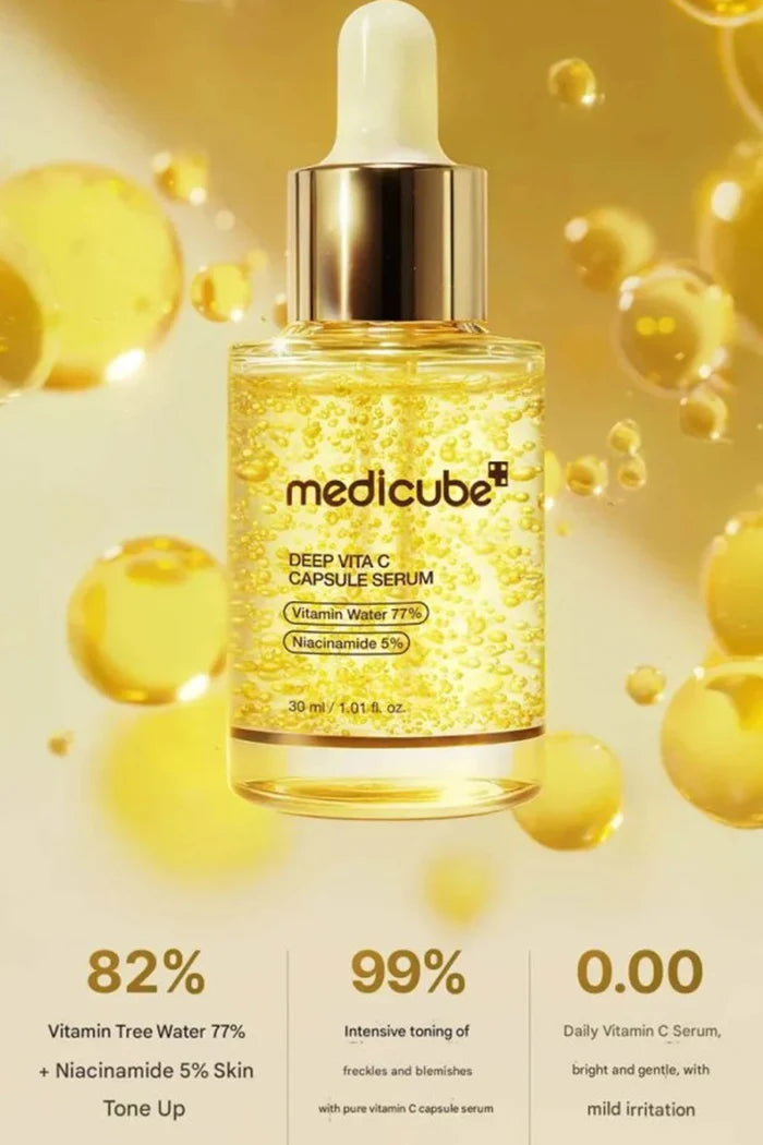 Medicube Deep Vita C Capsule Serum bottle with dropper on a yellow background