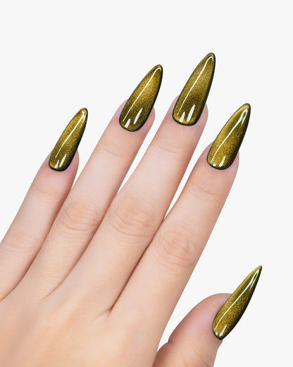 Hand with gold metallic nail polish on a white background