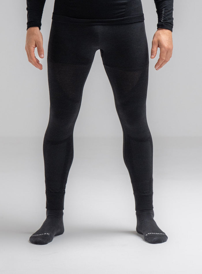 Louis Is 5ft 10" And Wears Size: M | Hem Studio Image Of Model Wearing Mountain Pro Merino Cordura® Base Layer Bottoms In Obsidian Black (SS Model)