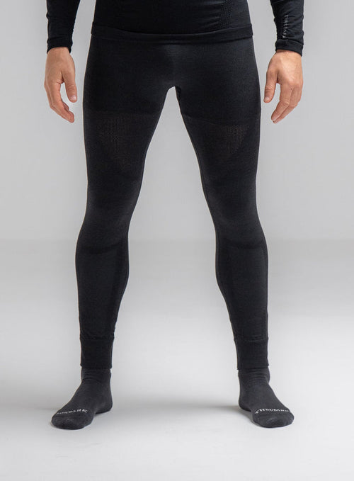 Louis Is 5ft 10" And Wears Size: M | Hem Studio Image Of Model Wearing Mountain Pro Merino Cordura® Base Layer Bottoms In Obsidian Black (SS Model)