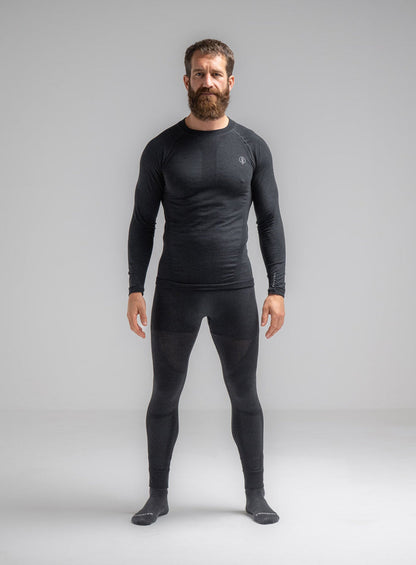 Louis Is 5ft 10" And Wears Size: M | Hem Studio Image Of Model Wearing Mountain Pro Merino Cordura® Base Layer Bottoms In Obsidian Black (SS Model)