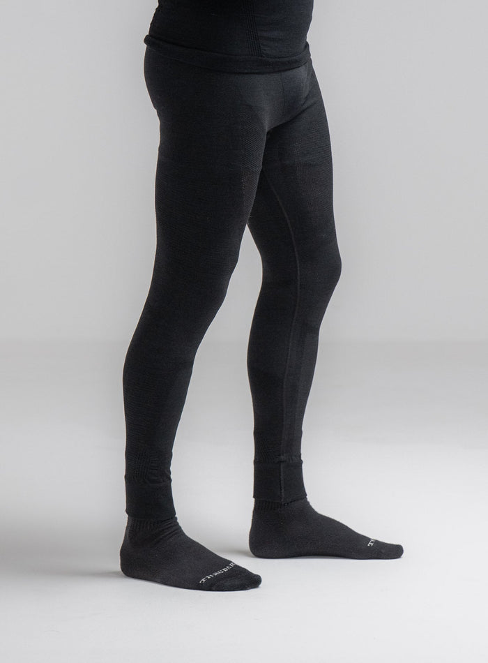 Louis Is 5ft 10" And Wears Size: M | Hem Studio Image Of Model Wearing Mountain Pro Merino Cordura® Base Layer Bottoms In Obsidian Black (SS Model)
