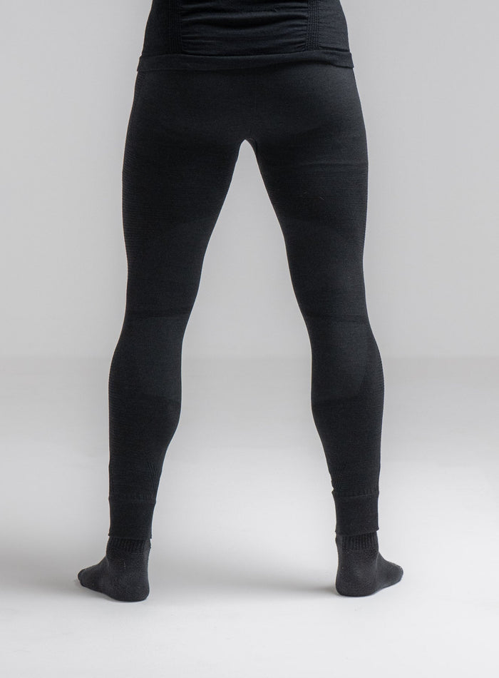 Louis Is 5ft 10" And Wears Size: M | Hem Studio Image Of Model Wearing Mountain Pro Merino Cordura® Base Layer Bottoms In Obsidian Black (SS Model)