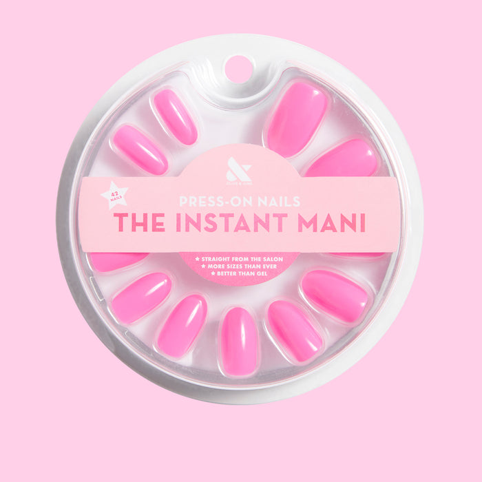 Neon Flamingo | Oval | Medium press-on nails in bright neon pink for an easy at-home mani with a smooth finish