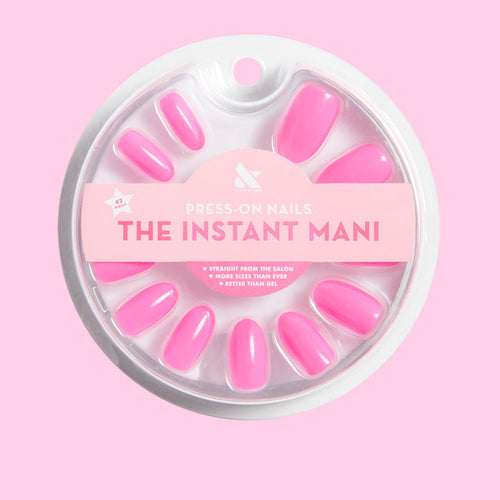Neon Flamingo | Oval | Medium press-on nails in bright neon pink for an easy at-home mani with a smooth finish