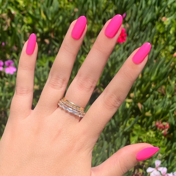 Neon Flamingo | Oval | Medium vibrant neon pink press-on nails in a medium oval shape for a polished at-home mani