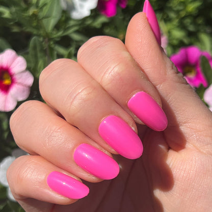 Neon Flamingo | Oval | Medium vibrant hot pink press-on nails in medium oval shape for a bright at-home manicure