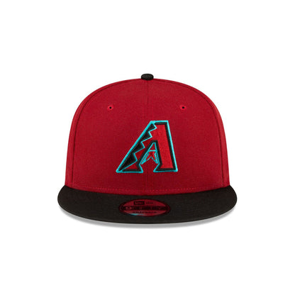 https://cdn.shopify.com/s/files/1/0601/2554/4675/files/60496177_9FIFTY_BASICSNAP_ARIDIA_OTCBLK_F.jpg?v=1705601001