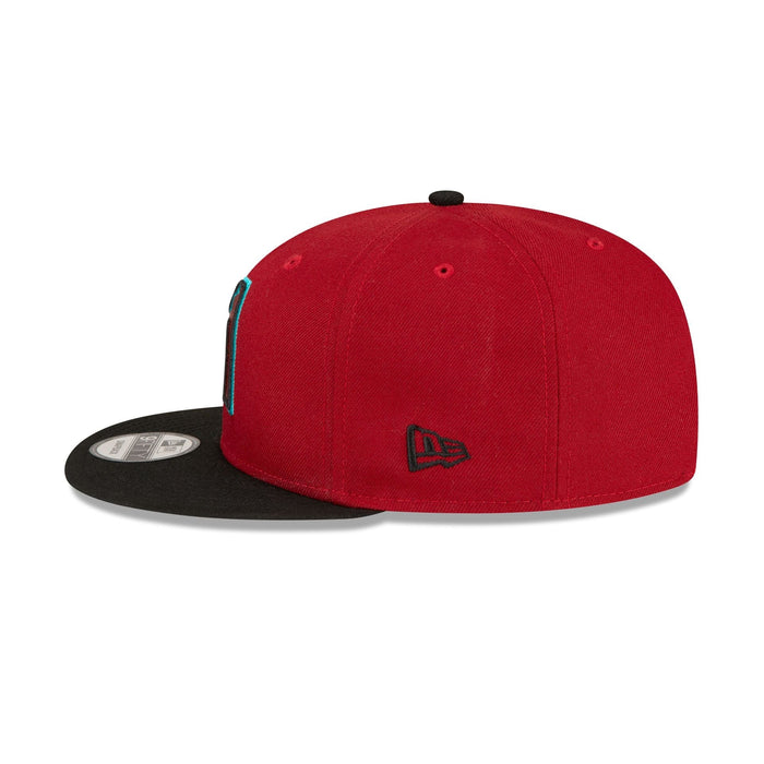 https://cdn.shopify.com/s/files/1/0601/2554/4675/files/60496177_9FIFTY_BASICSNAP_ARIDIA_OTCBLK_LSIDE.jpg?v=1705601001