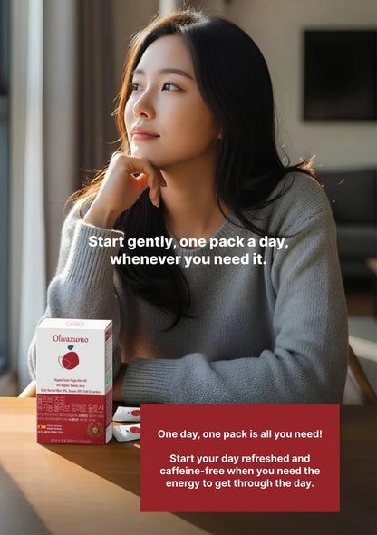 Woman sitting at a table with a box of Olimpium products, with promotional text overlay.