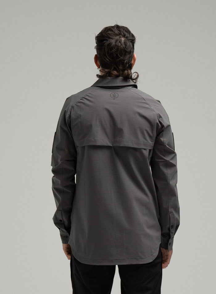 Bernie Is 6ft And Wears Size: M | Hem Studio Image Of Model Wearing Oryon Carbon Shirt In Wolf Grey (SS Model)