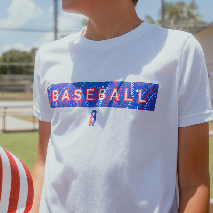 Youth model wearing red Paisley Freedom youth graphic tee