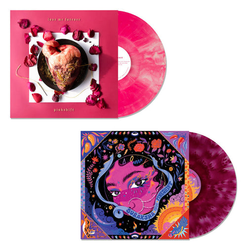 Two pink marbled vinyl records: Pinkshift’s “love me forever” (Pink Galaxy Vinyl, cover features a heart with rose petals) and “Breakers” (vivid cover with illustrated female face and patterns).