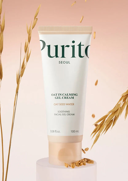 Purito oat cream tube with oats on a pink background