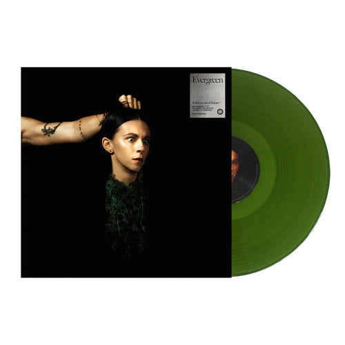 Product description: Striking album cover for PVRISs Evergreen—a severed head with short dark hair, neutral expression, held by an outstretched arm. Includes signed 12x12 print and translucent green vinyl, partially visible at right.