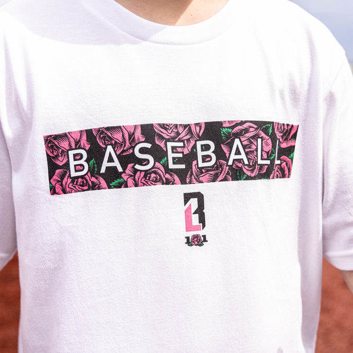 Youth model wearing white Radar Roses youth graphic tee