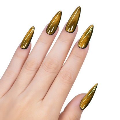 Hand with gold glittery nail polish on a white background