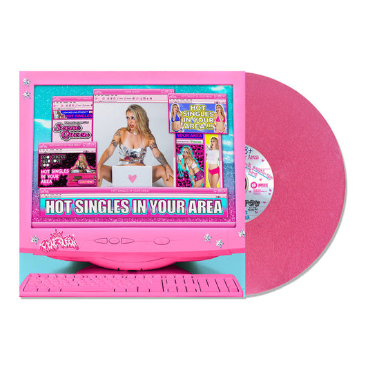 A limited edition pink vinyl from Scene Queen beside its cover, featuring a retro pink computer with images of women, bold HOT SINGLES IN YOUR AREA text, colorful pop-up ads, and an exclusive release tracklisting.