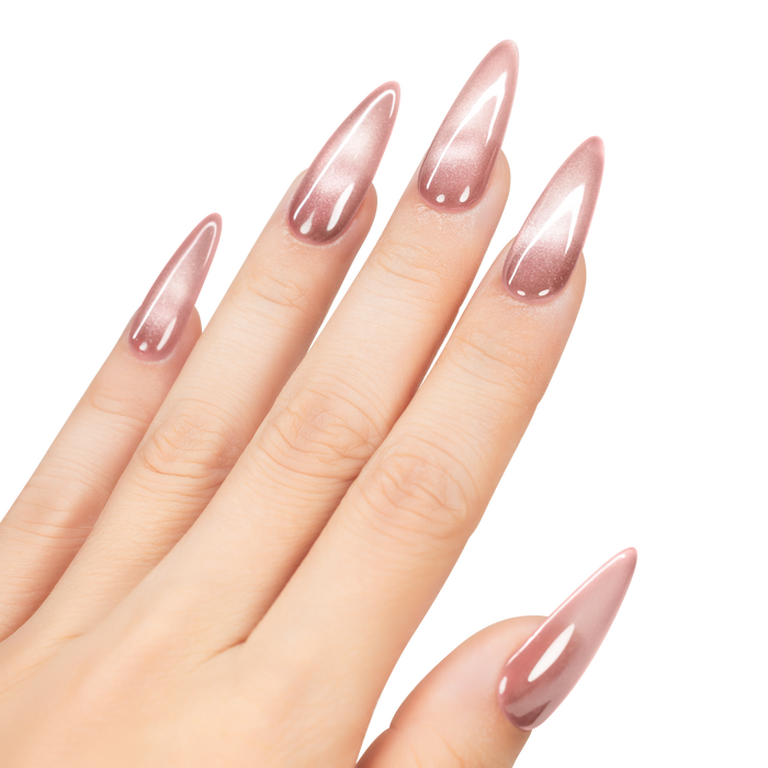 Hand with long, pointed nails painted with a pink nail polish on a white background