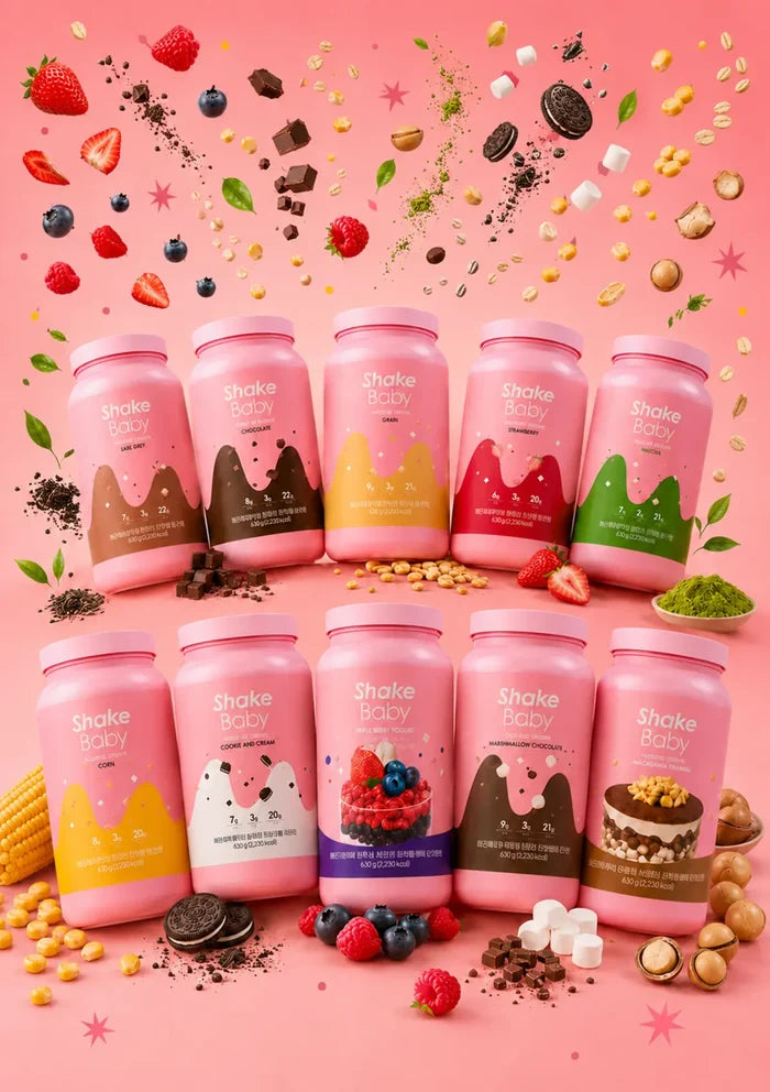 Shake Baby 630g meal replacement protein shake tubs in 10 flavours arranged on a pink studio background.