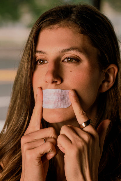 model wearing oi tape non-vented mouth tape