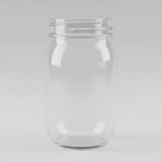 Clear glass container on a grey surface