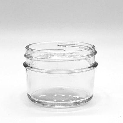 Clear glass jar on a white background