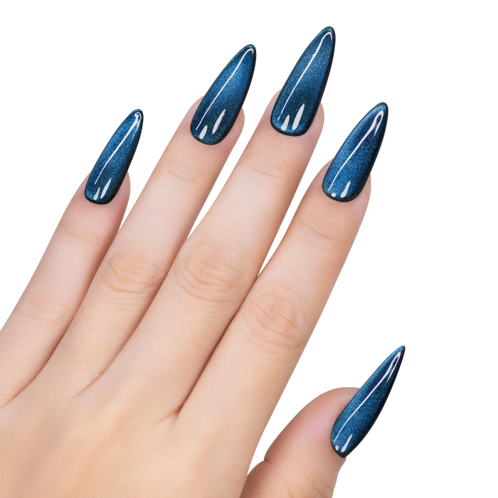 Hand with blue glittery nail polish on a white background