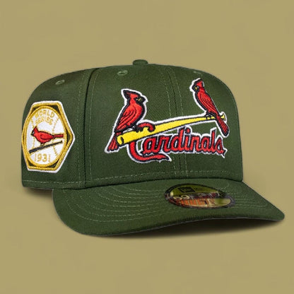 A green St. Louis Cardinals baseball cap with the team's logo and a patch commemorating the 1931 World Series on a yellow background.