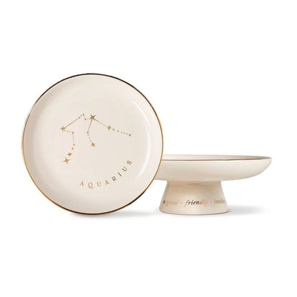Aquarius starry pedestal tray with round dish, gold rim, and constellation design