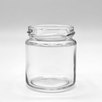 Clear glass jar on a white background