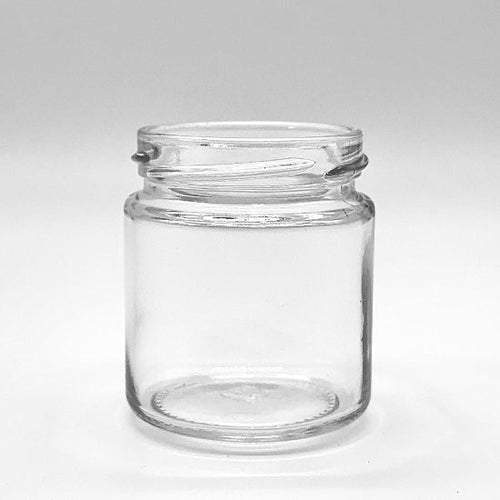 Clear glass jar on a white background