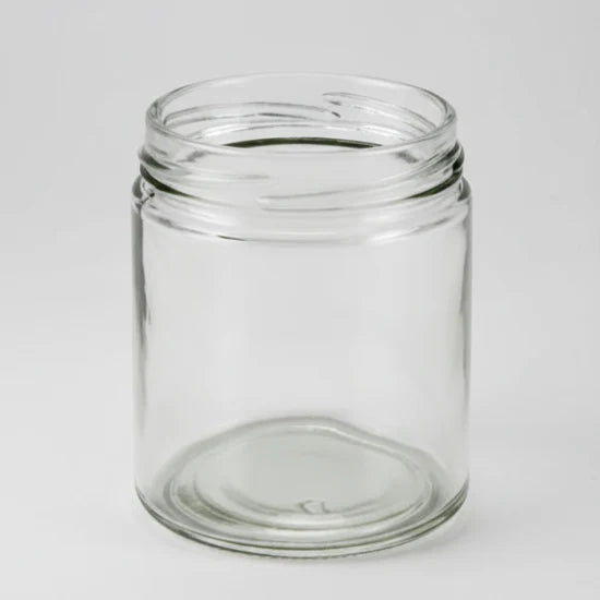 Clear glass jar on a white background
