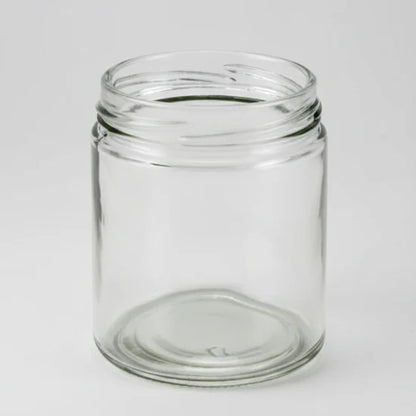 Clear glass jar on a white background