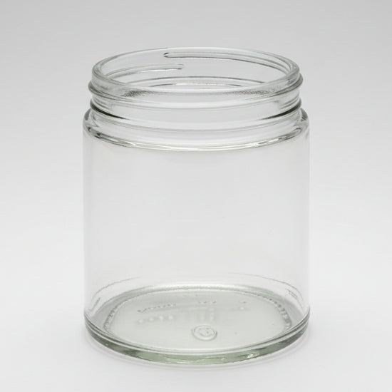 Clear glass jar on a white background