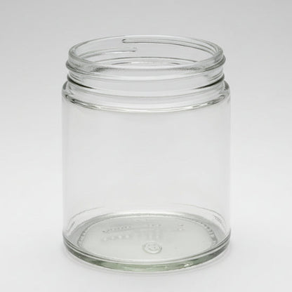 Clear glass jar on a white background