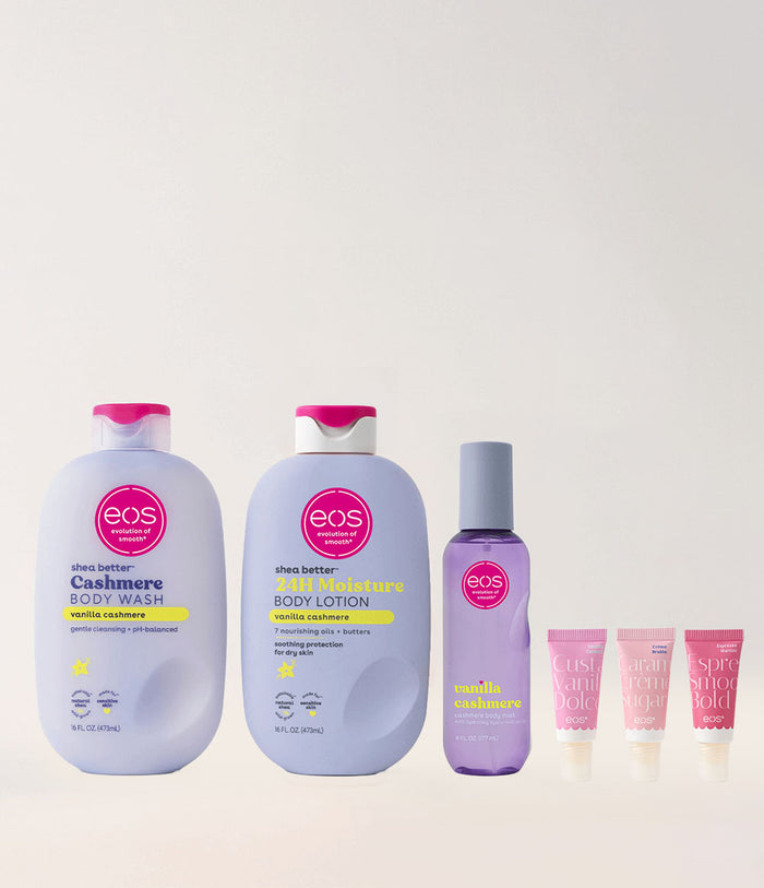 eos body care products including body wash, lotion, and lip balm on a light gray background