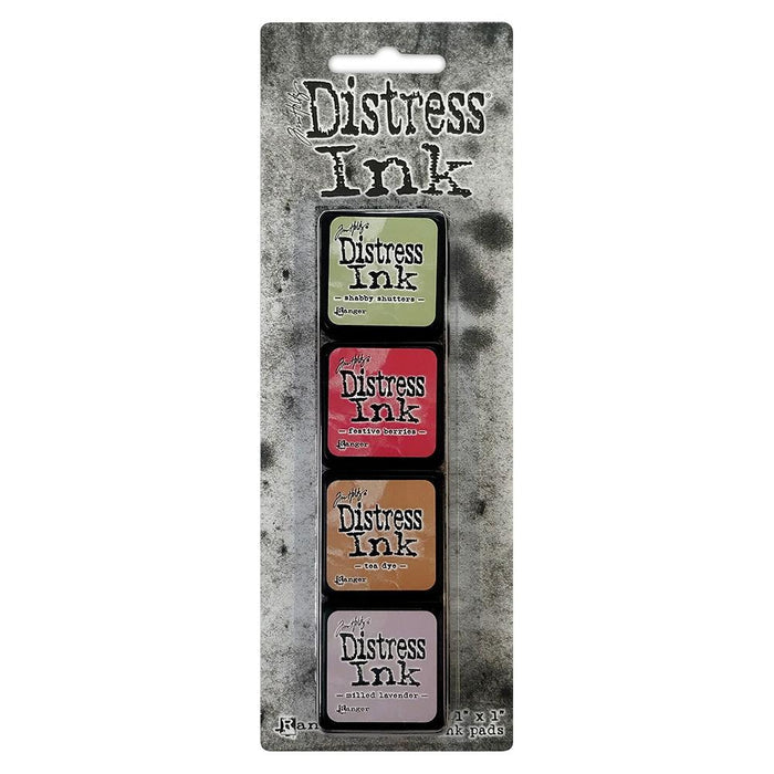 Ranger - Tim Holtz Distress Mini Ink Pads 4/Pkg - Kit #11. this package includes the colours: Shabby Shutters, Festive Berries, Tea Dye, Milled Lavender. Available at Embellish Away located in Bowmanville Ontario Canada.