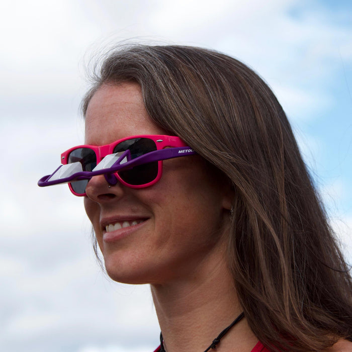Wearing Upshot Belay Glasses over sunglasses - Purple