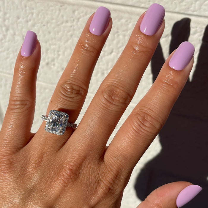 Hand featuring You're Invited - Press-On | Short | Squoval with playful lilac purple short squoval press-on manicure